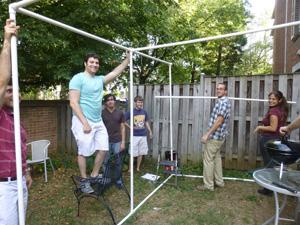 Moishe House Arlington residents and friends build their sukkah. The house opened Sept. 1 as a hub for young adults in Northern Virginia. Courtesy Moishe House Arlington