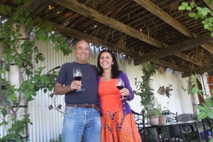 Ernie Weir and his wife, Irit, under the patio/sukkah at their kosher winery, Hagafen Cellars, on the Silverado Trail in Napa.