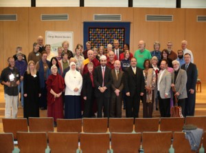 Various members of the caravan and local interfaith councils pose at the Universalist Unitarian Congregation of Rockville.  Photo by Steve D. Martin