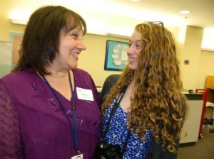 Kindergarten teacher Betsy Colbert, catches up with former student Elie Katz, now a 10th-grader. Photos by David Holzel