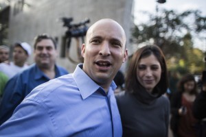Naftali Bennett says his wife Gilat, right, only drew closer to Judaism when the couple lived in New York.  Photo by Ilia Yefimovich/Getty Images 