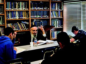 Yeshiva of Greater Washington will be renamed in honor of Rabbi Gedaliah Anemer z”l, seen here teaching Gemara class in the Belonofsky Bais Medrash. (Photos courtesy of YGW)