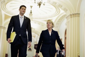 The House Budget Committee chair, Rep. Paul Ryan, and the Senate Budget Committee chair, Sen. Patty Murray, walk past the Senate chamber on their way to a press conference to announce a bipartisan budget deal earlier this month.  Photo by T.J. Kirkpatrick/Getty Images 