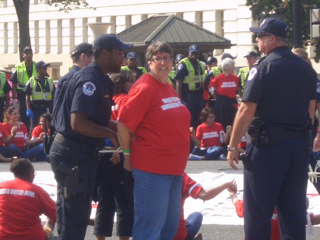 NCJW’s Sammie Moshenberg is arrested last September while protesting congressional inaction on immigration reform.