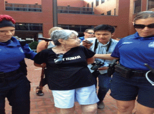 Holocaust survivor Hedy Epstein, 90, is arrested in downtown St. Louis on Aug. 18, after a march downtown to ask Missouri Gov. Jay Nixon to tone down police tactics in Ferguson.  Photo courtesy of Newscom. 