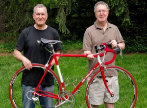 Richard Gordin, left, and his brother, Dr. Fred Gordin, pose with a bicycle.