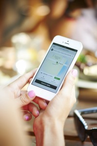 Uber, Lyft and other ride-sharing companies use a cell phone app to connect riders with drivers using their own car. Photo courtesy of Uber 