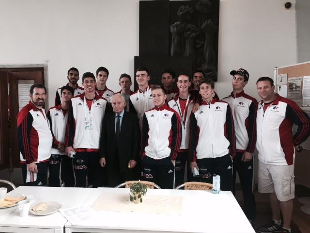 The USA 18-and-under basketball team meets with a Holocaust survivor at Wannsee, the Berlin suburb where Nazi leaders plotted the final solution to the Jewish question. Daniel Kuhnreich stands directly behind the survivor.Photo provided