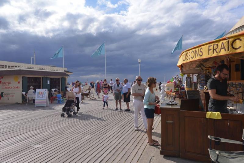 The entrance to the main boardwalk at Deauville beach is a busy spot.Photo by Cnaan Liphshiz