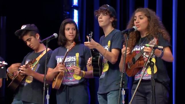 Ukuleles for Peace orchestra recently performed at the Kennedy Center’s Millennium Stage. The co-existence project brings together Arabs and Jews, who play ukulele and sing in English, Arabic and Hebrew. Screenshot via kennedy-center.org 