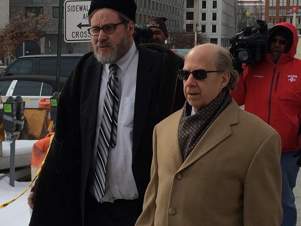 Rabbi Barry Freundel, left, with his lawyer, Jeffrey Harris, outside the courthouse where he pleaded guilty to 52 misdemeanor counts of voyeurism for spying on women at his Orthodox synagogue’s mikvah, Feb. 19, 2015. (Dmitriy Shapiro/Washington Jewish Week)