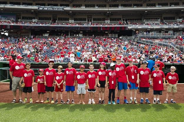 Kids from Congregation Etz Hayim on the field at Nationals Park before the ballgame.