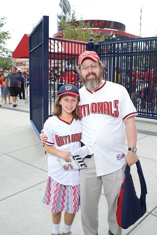 A father and daughter ready to root on the Nats at Jewish Community Day at Nationals Park.