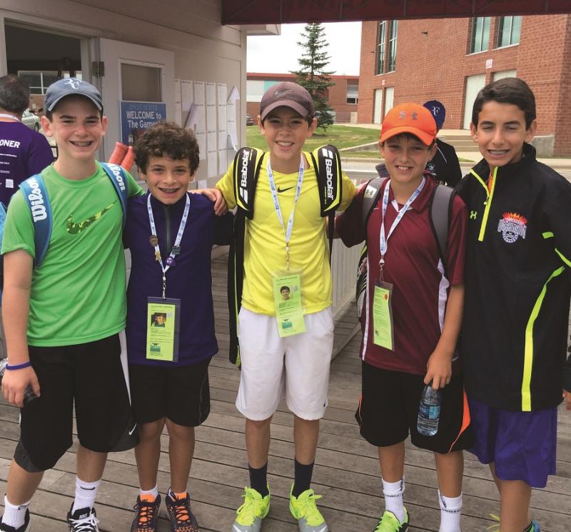 Josh Robinson, pictured second from right with JCC of Greater Washington boys’ tennis players.