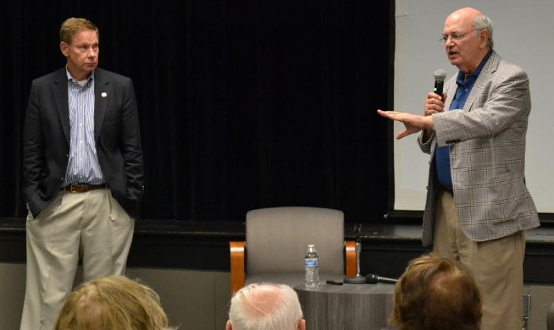Former Rep. Martin Frost (D-Texas) speaks about the new book The Partisan Divide: Congress in Crisis at the Jewish Community Center of Northern Virginia in Fairfax on Sunday while co-author and former Rep. Tom Davis (R-Va.) looks on. Photo by Josh Marks