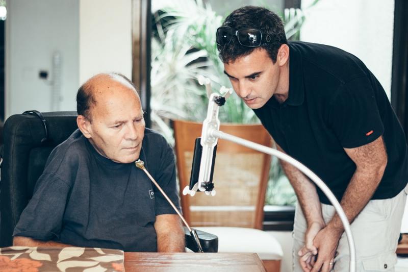 Oded Ben Dov (right) worked with potential phone users to develop a Smartphone that is controlled by head movements. It was developed by an Israeli startup.Photo by Basti Hansen