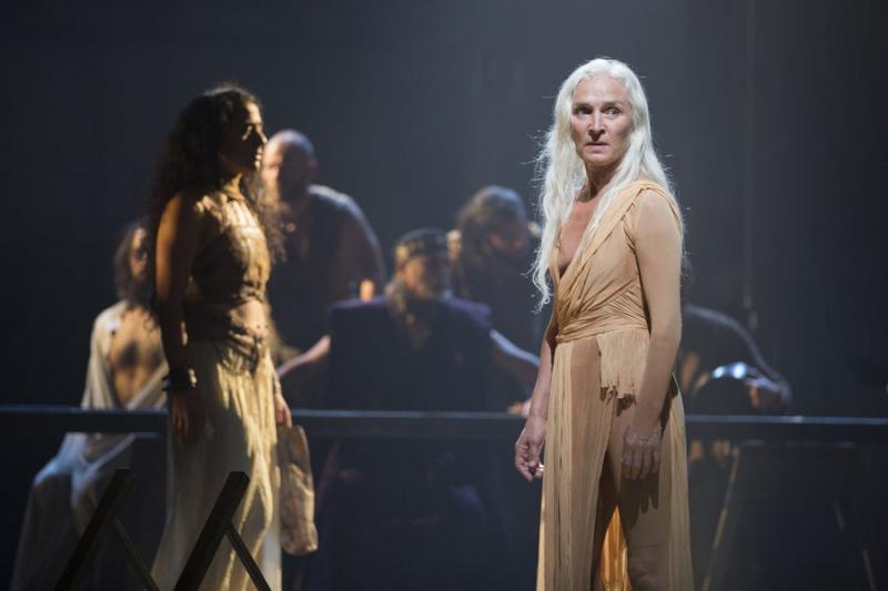 Olwen Fouéré, foreground, as Nameless Woman, with Nadine Malouf, left, as Salomé, and the cast of Yaël Farber’s Salomé at the Shakespeare Theatre Company. Photo by Scott Suchman