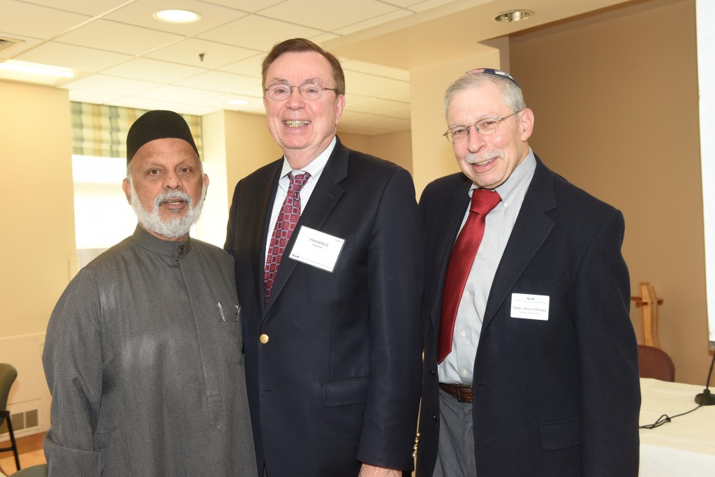 Charles E. Smith Life Communities on Oct. 29 brought together faith leaders from varied denominations to address issues relating to elder abuse. Faith leaders learned how to educate congregants in their communities about elder abuse, recognize the signs of abuse and access help. Pictured, left to right: Imam Faizul Khan of the Islamic Society of the Washington Area; Rev. Mansfield “Kasey” Kaseman, Montgomery County interfaith community liaison; and Rabbi James Michaels, Charles E. Smith Life Communities.Photo by Hilary Schwab