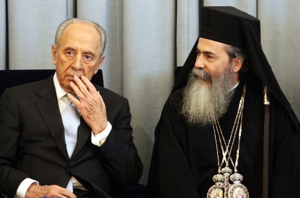 Israeli President Shimon Peres, left, meets with the Greek Orthodox patriarch  of Jerusalem, Theofilos III, in Jerusalem in 2007. Photo by Kobi Gideon/FLASH90