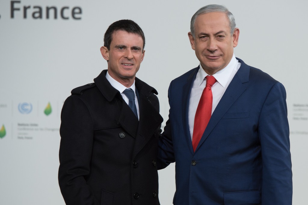 French Prime Minister Manuel Valls, left,  welcomes Israeli Prime Minister Benjamin Netanyahu during the COP21 United Nations Climate Change Conference on Nov. 30 in France. Photo by Thierry Orban/Getty Images