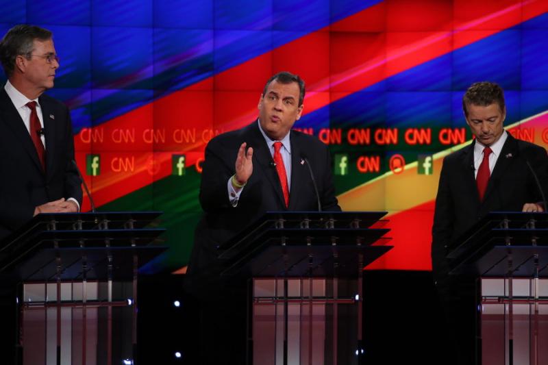 At the Dec. 15 Republican presidential debate, New Jersey Gov. Chris Christie, flanked by former Florida Gov. Jeb Bush, left, and Sen. Rand Paul of Kentucky, told viewers that “we have people across this country who are scared to death.” Photo: Riccardo Savi/Ruth Fremson/The New York Times/Newscom