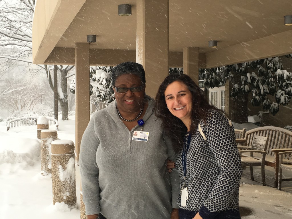 Employees of Charles E. Smith Life Communities worked through the weekend to keep more than 1,100 residents across the 38-acre campus safe and warm during the recent blizzard. Pictured are Olivia Kitcher-Yamikeh, assistant director of nursing services, left, and Dr. Elisa Gil-Pires, vice president of medical affairs/medical director. Photo courtesy of Charles E. Smith Life Communities 