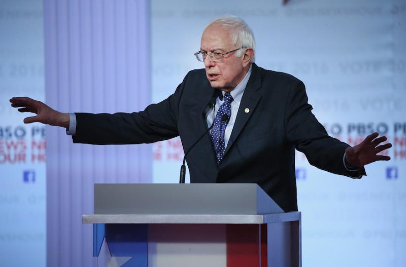 Bernie Sanders participates in the PBS NewsHour Democratic presidential candidate debate on Feb. 11. Win McNamee/Getty Images via JTA