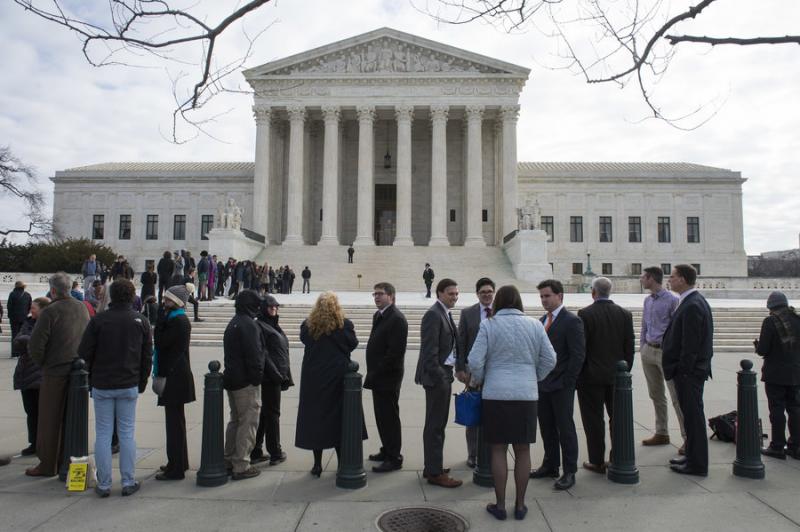 A line forms to enter the Supreme Court on Monday, the first day of oral arguments since the death of Justice Antonin Scalia left the court with eight justices. The court will hear arguments in Zubik v. Burwell next month. Photo by Kevin Diestch/UPI