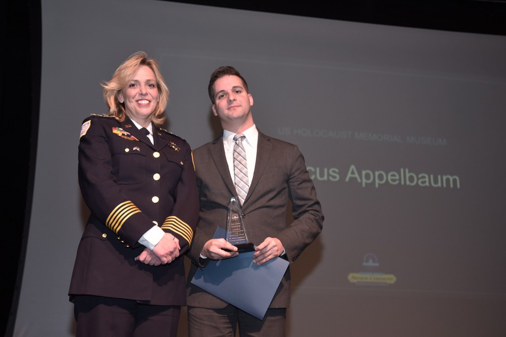 Marcus Appelbaum, right, director of law, justice and society initiatives for the U.S. Holocaust Memorial Museum, accepts the 2016 Chief of Police Special Award, which honors community partners, from Metropolitan Police Department Chief Cathy L. Lanier.Photo by Anthony Brown, Metropolitan Police Department