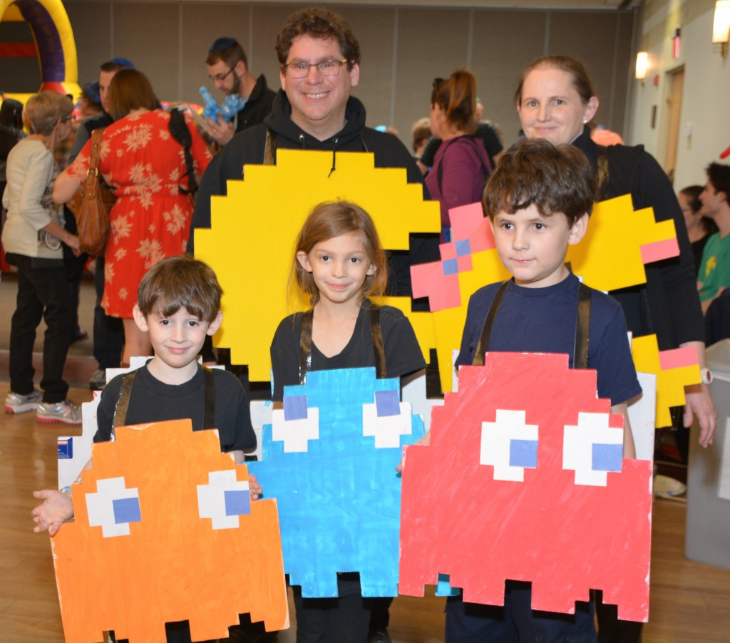 Winning in the “Best Family-Themed Costume” category at Purim Palooza, held March 13 at Congregation Beth Emeth in Herndon, was the Zaret family, front, from left: Solly, Ori, Isaac, and back, Elliot and Zoe.Photo courtesy of Beth Emeth