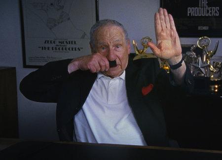 Mel Brooks doing a Hitler bit in an interview for The Last Laugh, director Ferne Pearlstein’s new documentary about Holocaust humor.. Tangerine Entertainment via JTA 