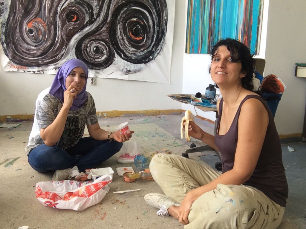 Lunch in studio: Siegel, right, and Egbariah often enjoy a picnic lunch on the floor of their shared studio. Photo courtesy of Shirley Siegel 
