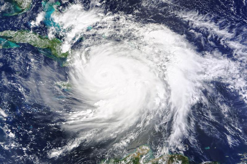 Environmentalists believe climate change exacerbates extreme weather events like hurricane Mathew, pictured. Photo: Creative Commons/NASA