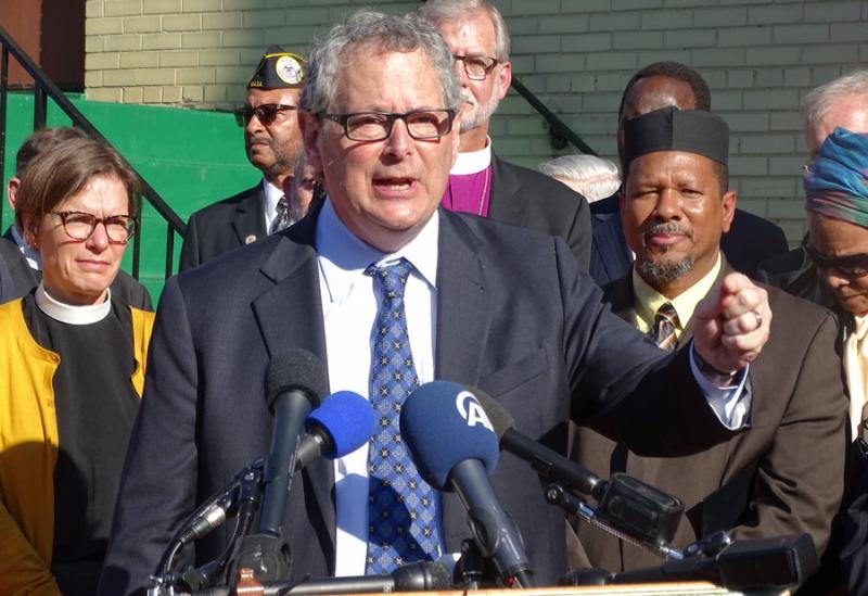 Rabbi Jack Moline speaks to reporters at an interfaith clergy gathering of solidarity in front of the Masjid Muhammad mosque in Washington on Friday.