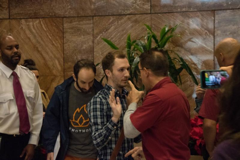 Chris Hicks (center) was one of the protesters and organizers of IfNotNow’s demonstration outside the Republican Jewish Coalition’s office. Photo by Justin Katz 