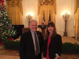 Jewish Federations of North America Washington office director William Daroff, left, and his wife Heidi attend the Obamas’ final White House Chanukah reception on Dec. 14. Photo from Facebook.