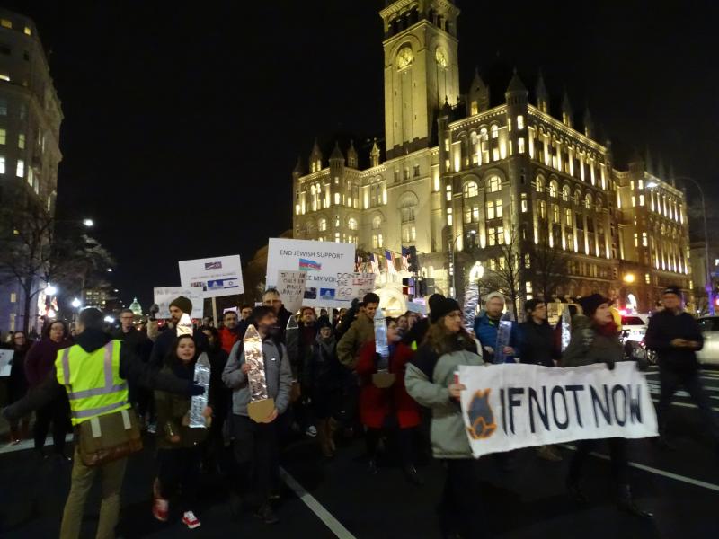 After a rally in front of the Trump International Hotel in Washington, IfNotNow protestors walked back along Pennsylvania Avenue to Freedom Plaza. Photo by George Altshuler