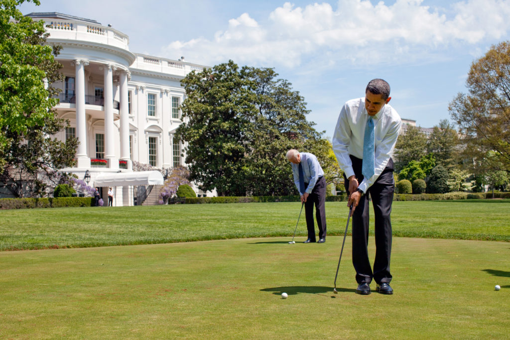 President Barack Obama and Vice President Joe Biden practice their putting on the White House putting green April 24, 2009. Official White House Photo by Pete Souza