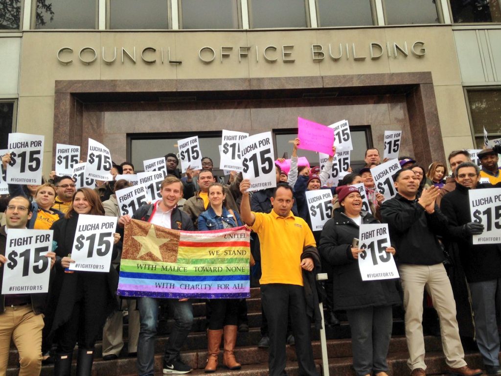 Supporters of the $15 minimum wage celebrate outside the Montgomery County Council Building.  Photo from the Twitter account of UFCW Local 400